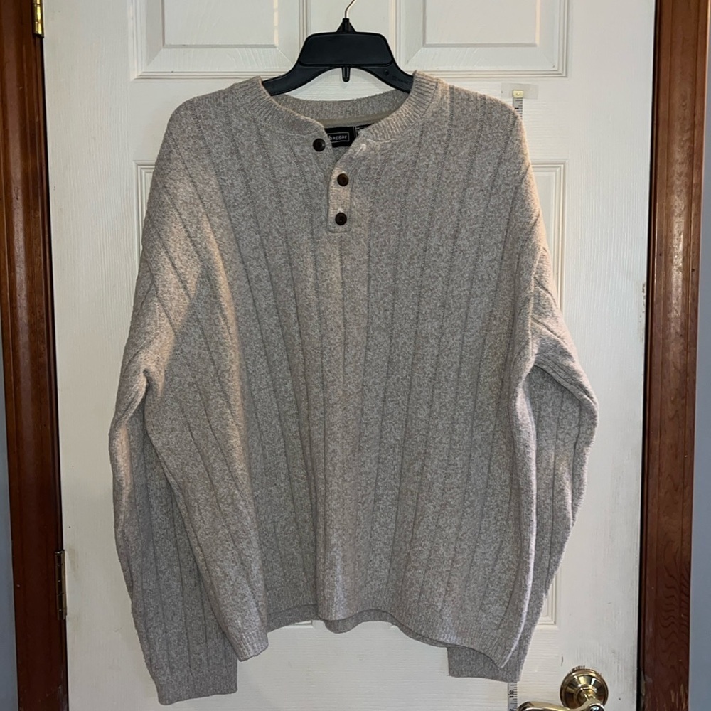 Hagger-XXL-tan-large ribbed detail,long sleeves, three button, crewneck sweater.